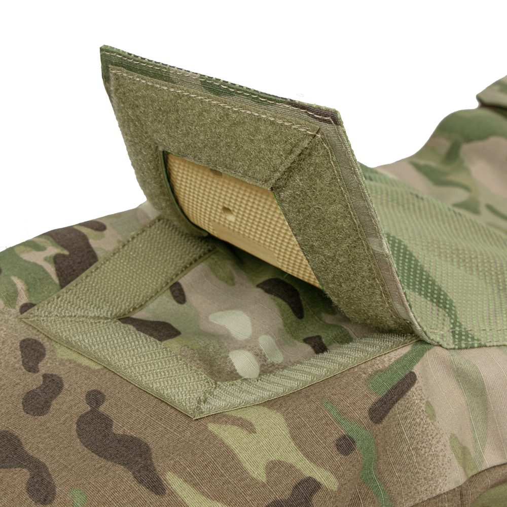 Close-up of Condor’s Paladin Tactical Pants in MultiCam, featuring an open Velcro flap revealing a ballistic trauma pad insert.