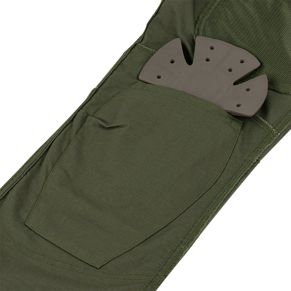 Close-up of a green fabric pocket on Condor Odyssey Pants Gen III with a partially inserted removable black foam knee pad, designed for Military and First Responder use.