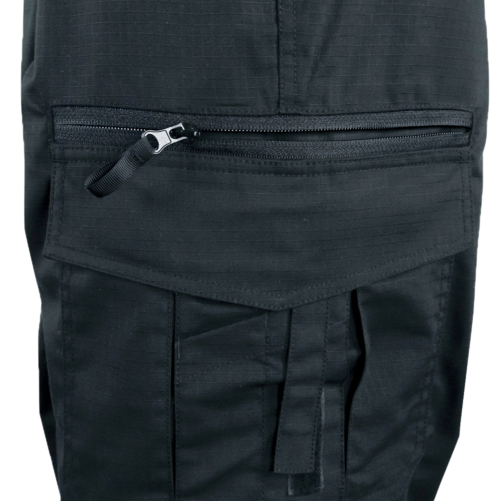 Close-up of Condor Womens Protector EMS Pants in black, highlighting a horizontal zippered pocket above a flap pocket with tab and stitching, designed for first responders.