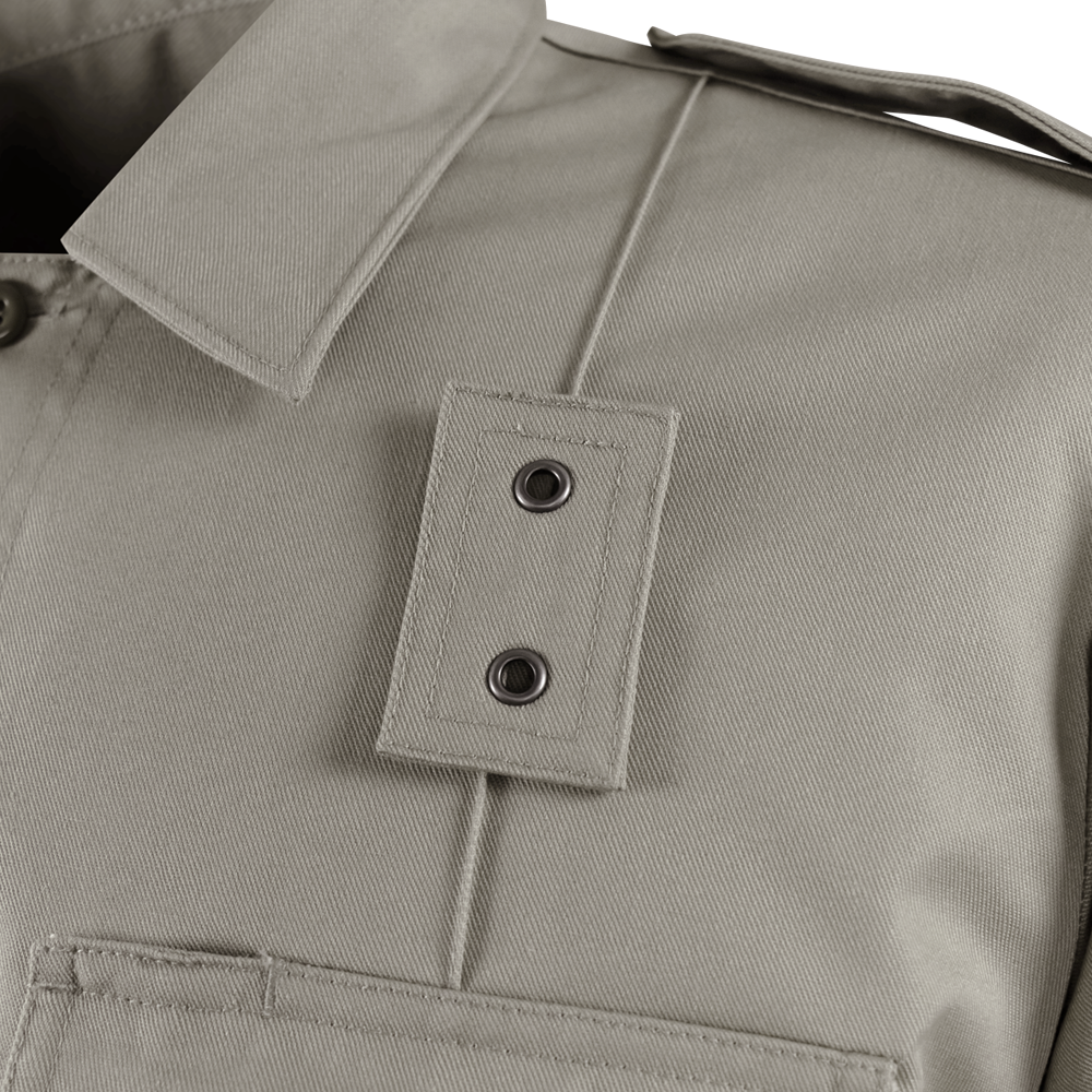 Close-up of the Condor Mens Class B Uniform Shirt in khaki, featuring a pointed collar, shoulder epaulet, chest pocket with visible stitching, and metal snap buttons. Now on SALE.