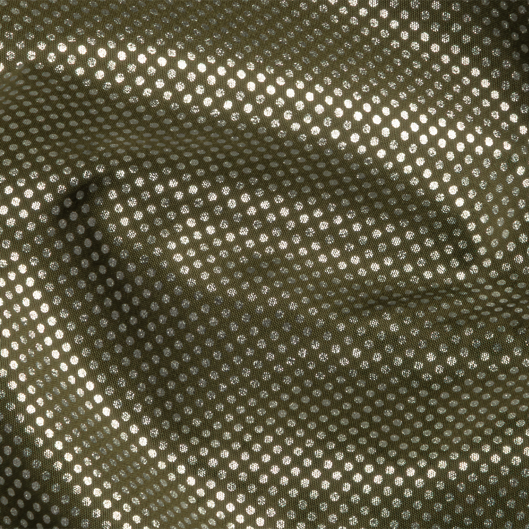 The Condor Aegis Waterproof Parka features olive green fabric with a small, evenly spaced white polka dot pattern and visible folds.
