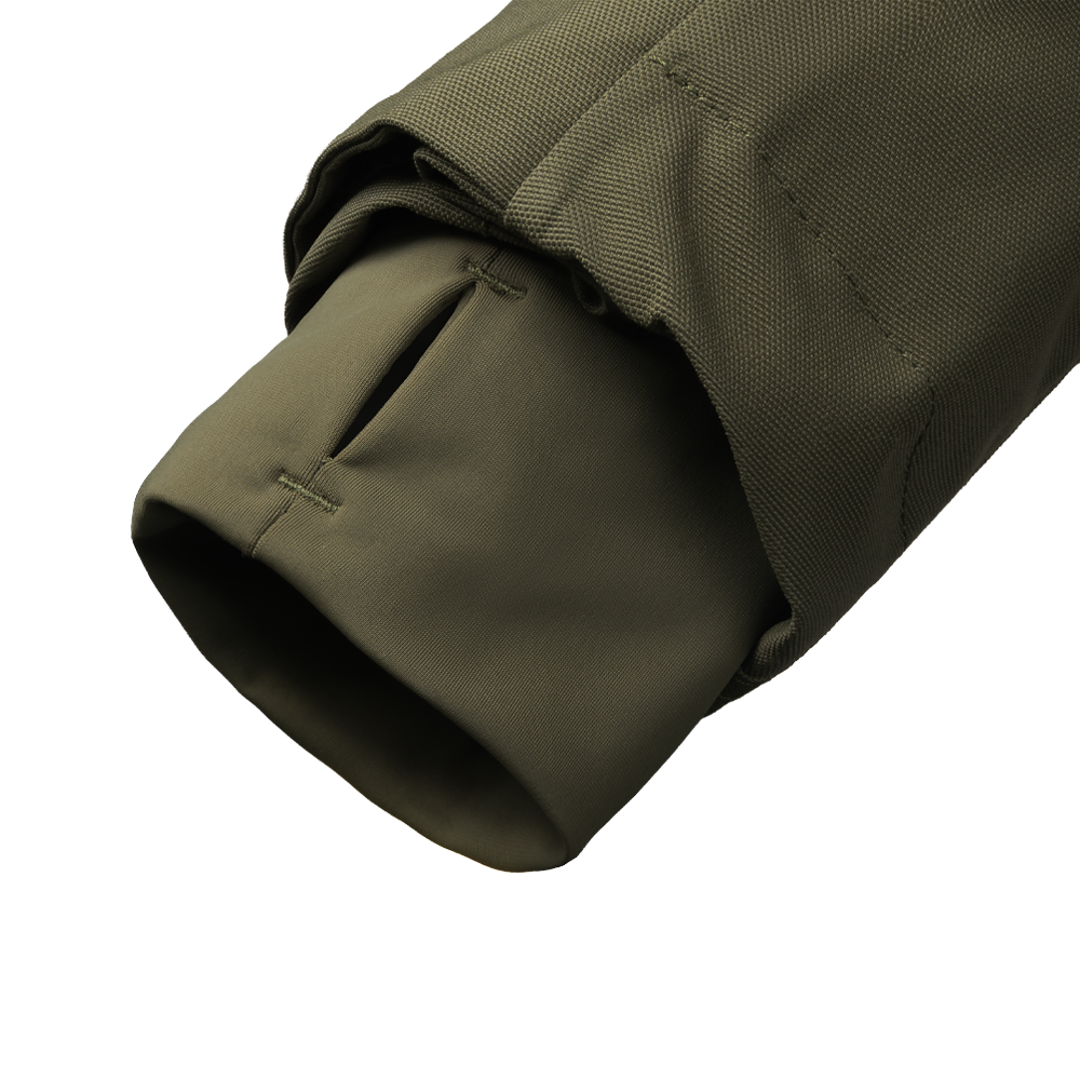Close-up of the Condor Aegis Waterproof Parka's green sleeve, featuring a built-in thumb hole cuff and reinforced outer fabric.