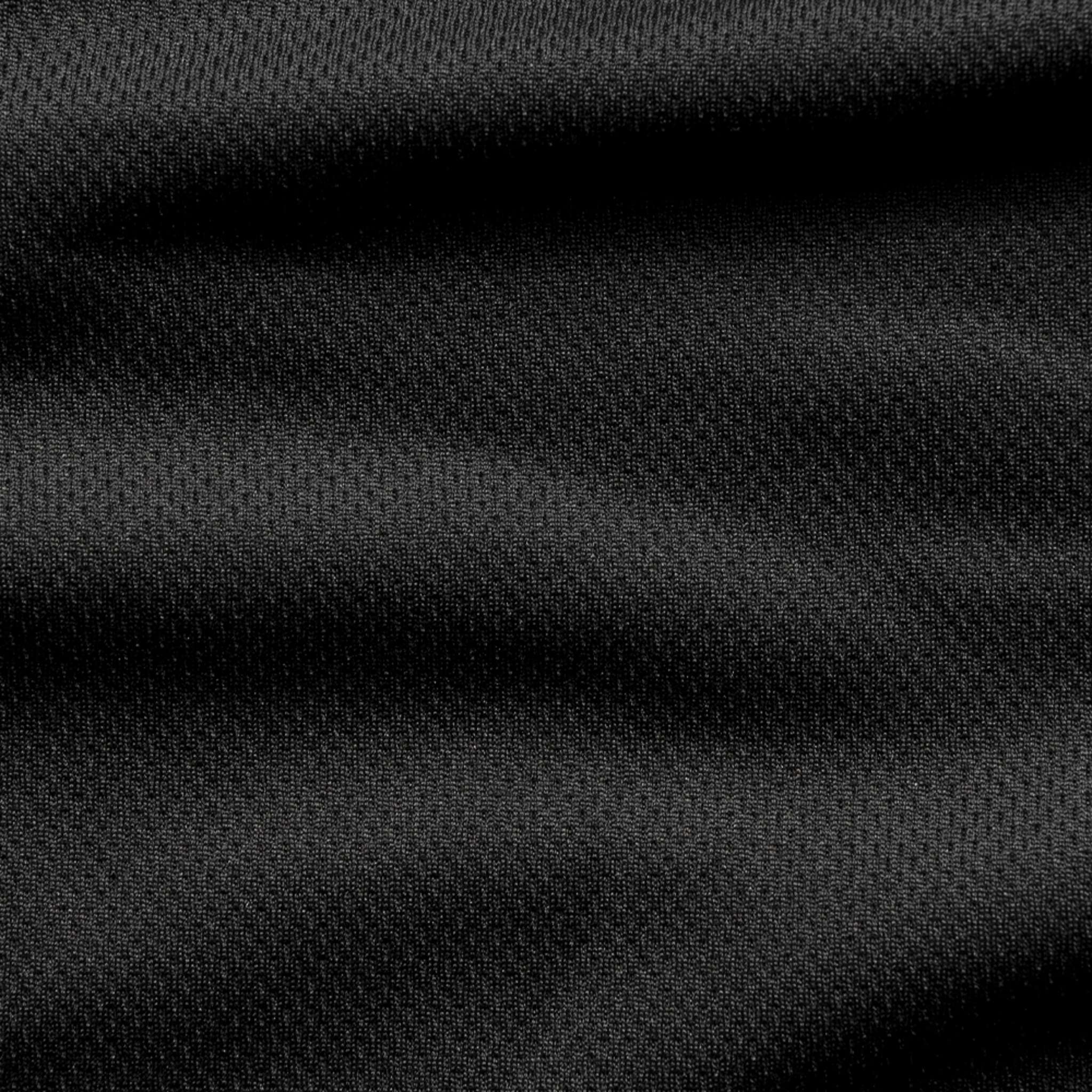 Close-up of the Condor Trident Sun Shirt in black, highlighting its textured fabric, subtle folds, and fine weave pattern.