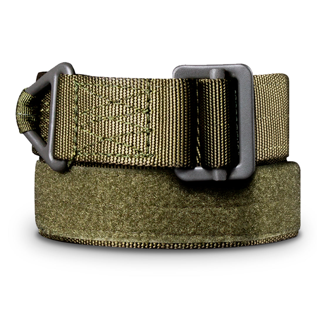 The Condor Riggers Belt, made of olive green tactical nylon with a sturdy plastic buckle, is rolled up and displayed against a white background.