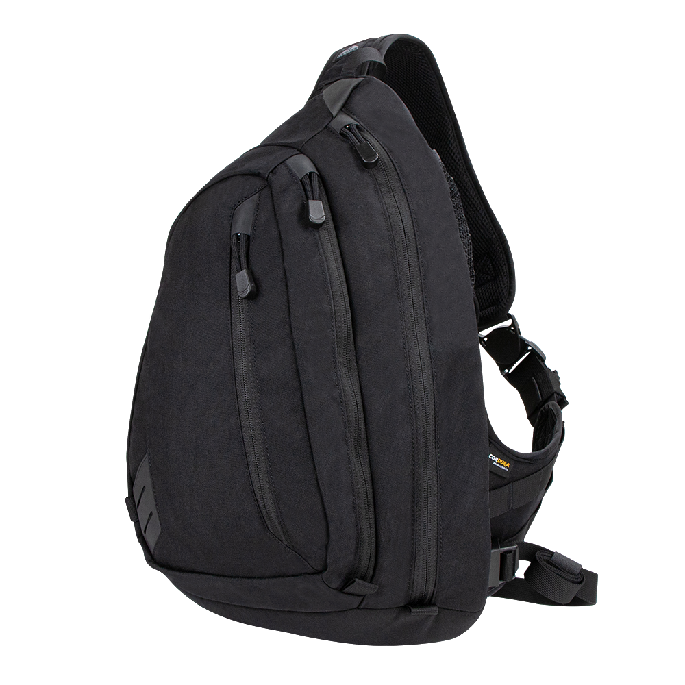 The Condor Elite Sector Sling Bag 18L by Condor features two zippered compartments, a small side pocket, and an adjustable padded shoulder strap in tactical black.