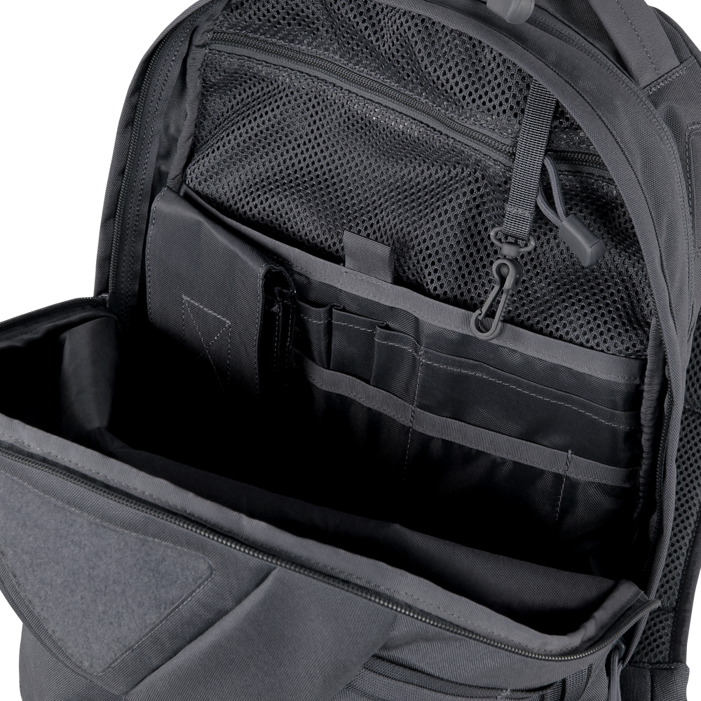 The Condor Elite Fail Safe Urban Backpack Gen II 18L from Condor features a black open design with interior compartments, mesh zip pocket, pen slots, and multiple sections—ideal for everyday carry or trips to the shooting range.