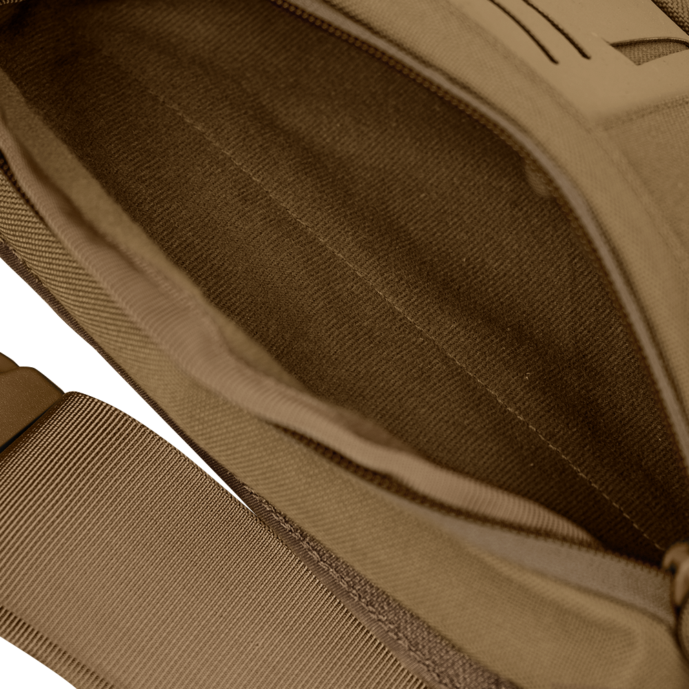 Close-up view of the Condor Draw Down Waist Pack Gen III in tan, showing its tactical fabric interior, visible zipper, and strap.