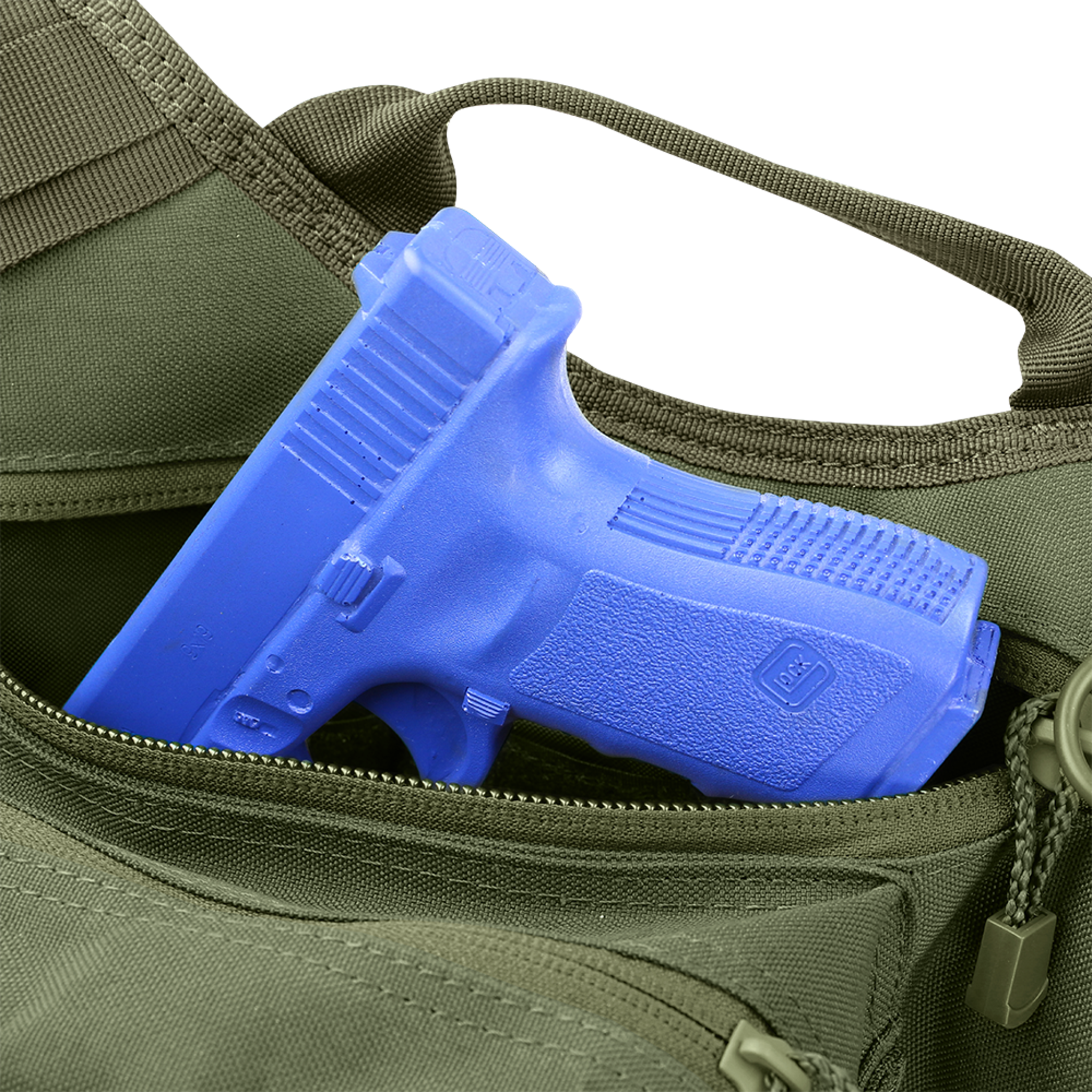 A blue plastic training pistol is partially visible inside the open pocket of a green Condor EDC Bag | SALE.