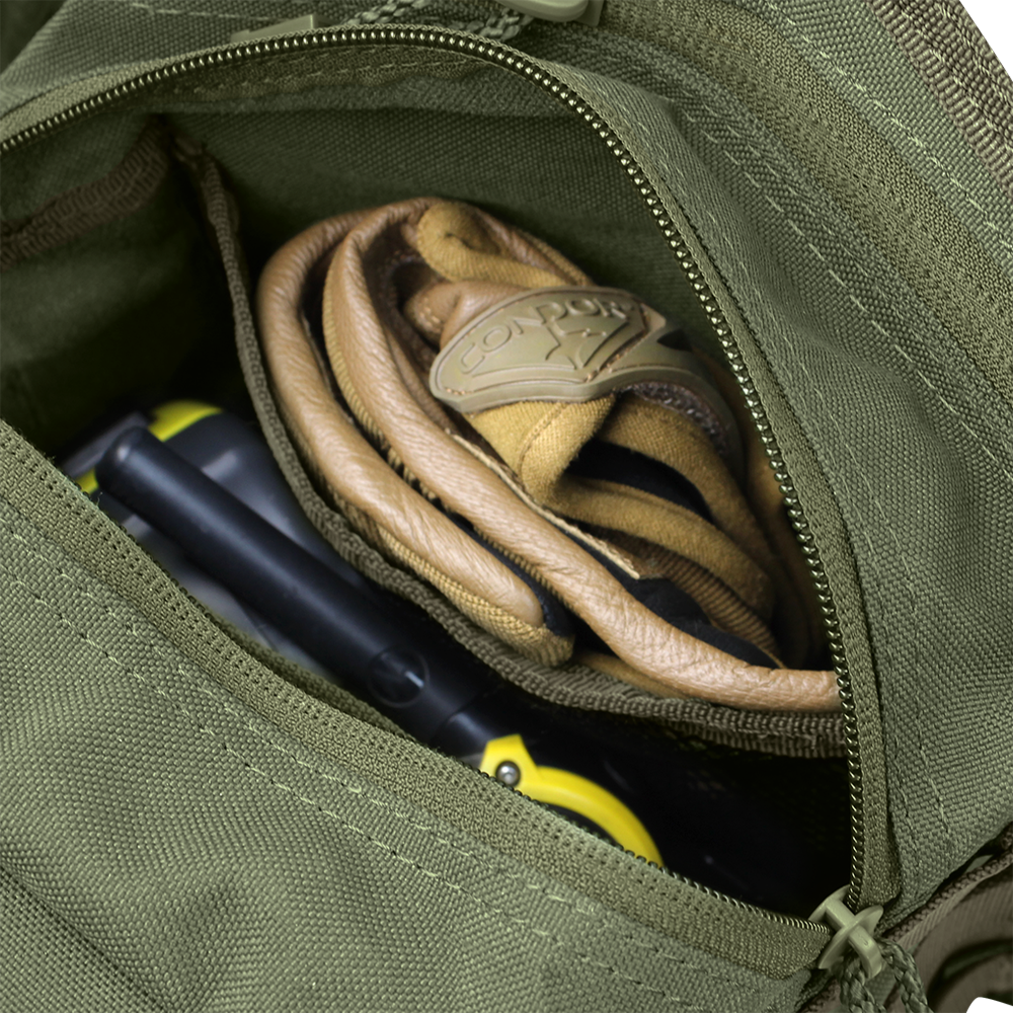 A Condor EDC Bag | SALE: an open green zippered pouch with tan gloves and a yellow and black device inside.