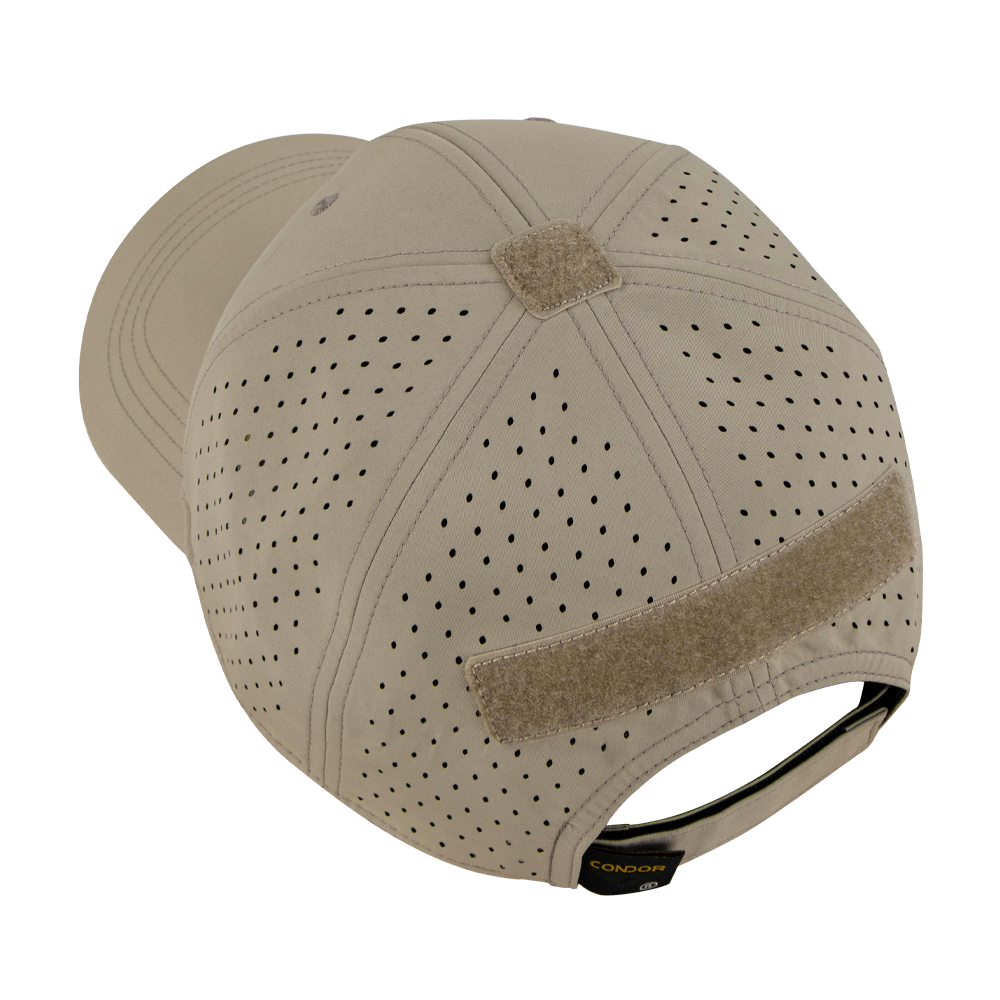 The Condor HydroFit Team Mesh Cap, in tan with rear hook-and-loop patch, is shown at an angle from the back on a wooden surface.