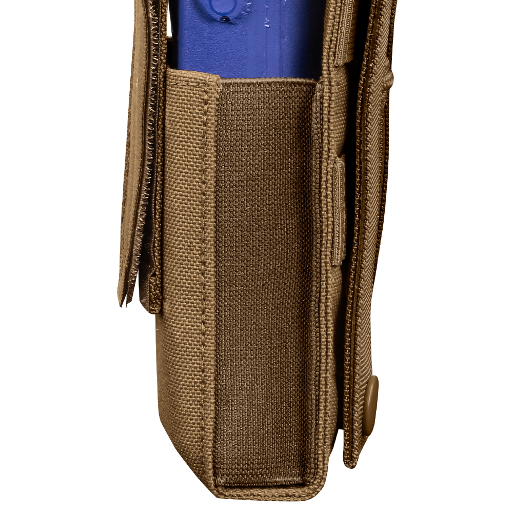 A close-up side view of the Condor Patrol Radio Pouch Gen II in tan fabric, featuring a flap with snap button securing a blue plastic object—perfect for bushcraft or shooting range use.