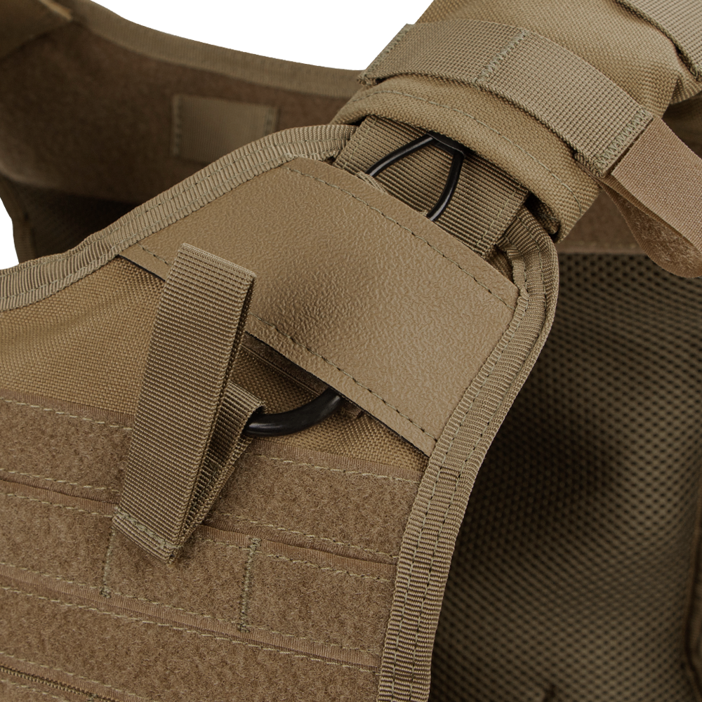 Close-up of the Condor Enforcer Releasable Plate Carriers tan shoulder strap, featuring loop, hook-and-loop fastener, and black D-ring—perfect for law enforcement or bushcraft use.