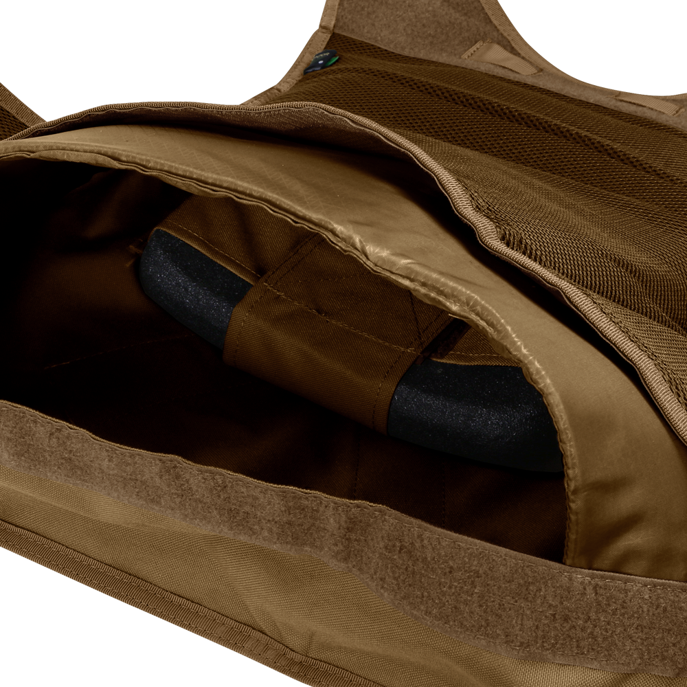 A close-up of the inside of the Condor EXO Plate Carrier Gen II reveals a black protective plate inserted into its pocket.