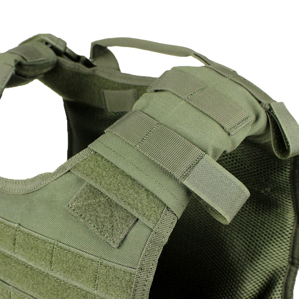 Close-up view of the Condor Defender Plate Carrier, a green tactical vest featuring adjustable shoulder straps, Velcro patches, and webbing detail.