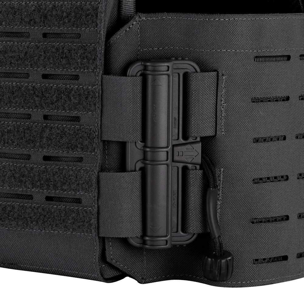 Close-up of the Condor Vanquish RS Plate Carrier in black, featuring a secured radio attached to the side with nylon straps and a cord.
