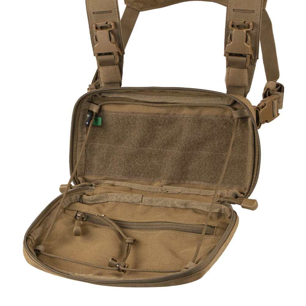 The Condor Stowaway Chest Rig in tan is open, revealing multiple zippered mesh compartments and interior straps—perfect for military or law enforcement applications.