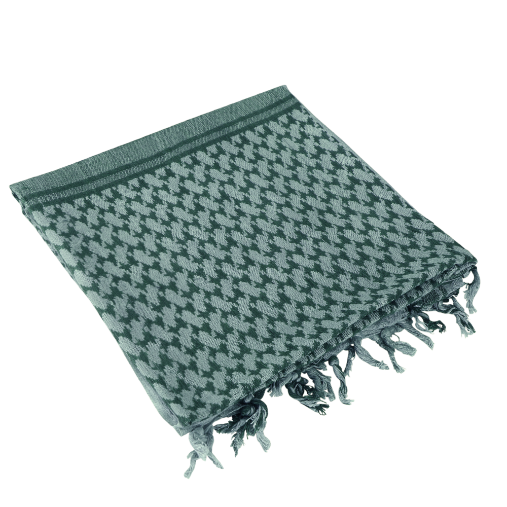 The Condor Shemagh in Foliage & Green features a classic pattern, made from 100% cotton with knotted fringe edges—ideal for use as traditional headwear.