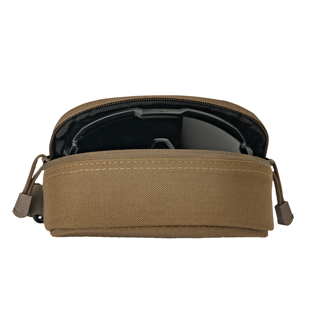 A tan Condor Sunglasses Case with a zipper is partially open, showing a black object inside against a plain white background.
