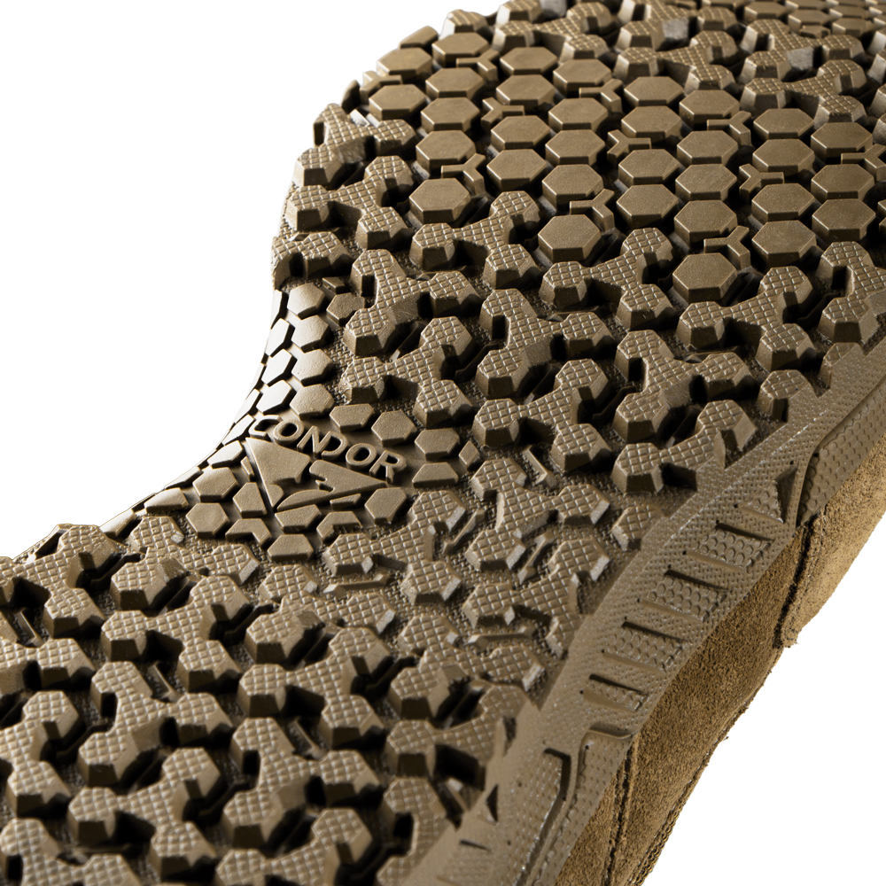 Close-up of the textured, hexagonal-patterned sole of the Condor Brigade 8