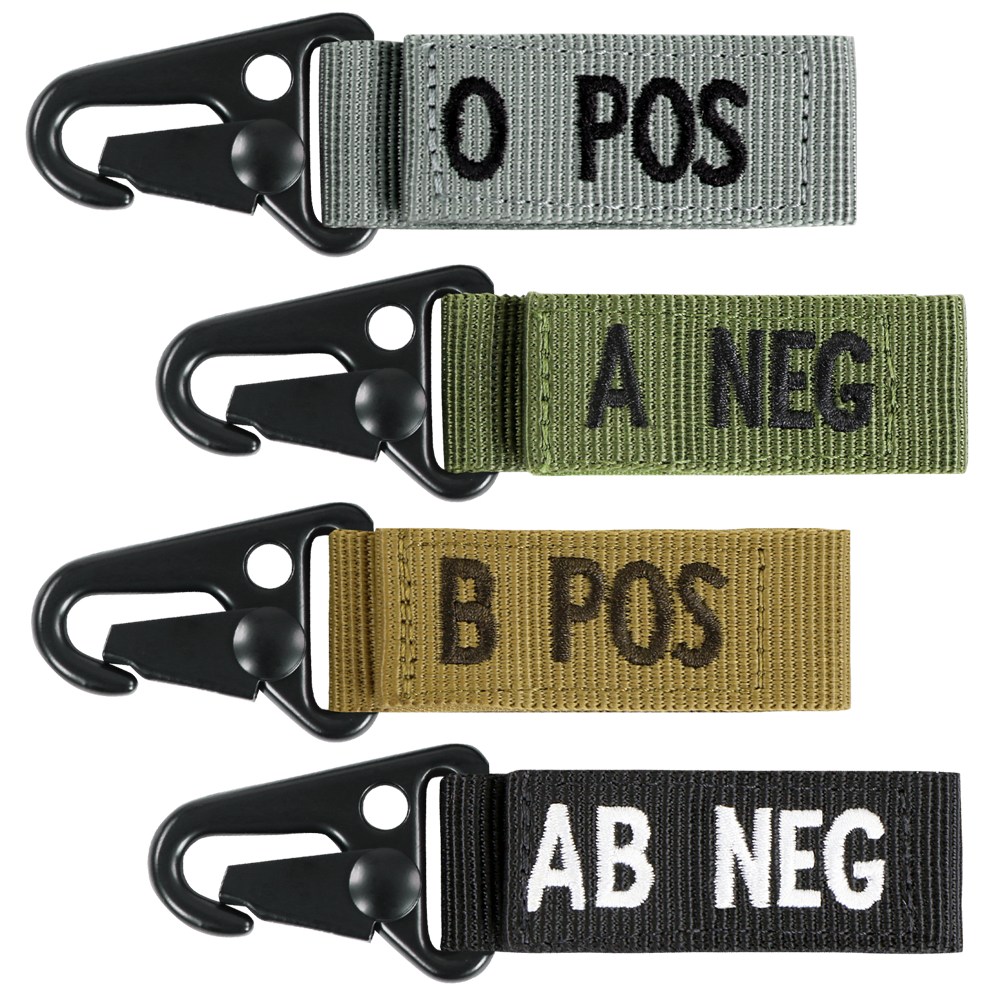 The Condor Blood Type Key Chain set features four fabric keychains with plastic clips, each in a unique color and labeled O POS, A NEG, B POS, or AB NEG.
