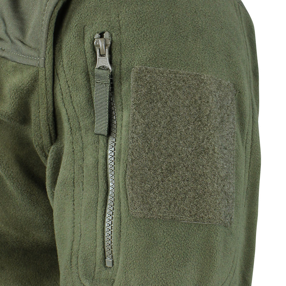 Close-up of the Alpha Fleece Jacket by Condor, featuring a green sleeve with a zippered pocket, pull tab, and rectangular loop fabric patch for attaching patches.