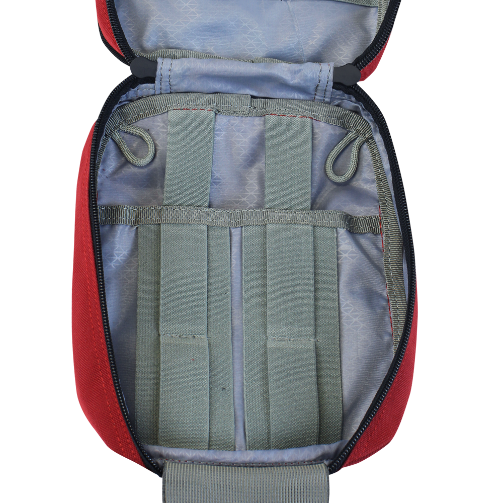 The Condor Rip-Away EMT Pouch is opened to reveal a gray interior featuring elastic straps and loops for organized storage of your gear.